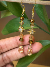 Load image into Gallery viewer, Brown Starburst Dangle Earrings
